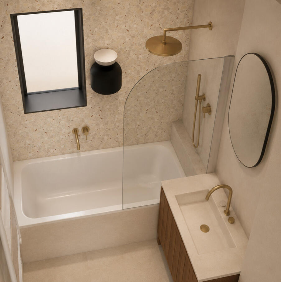 Salle de bain avec baignoire et robinetterie dorée — Atelier Luzons Salle de bain avec baignoire encastrée, robinetterie dorée et carrelage terrazzo, rénovation Atelier Luzons